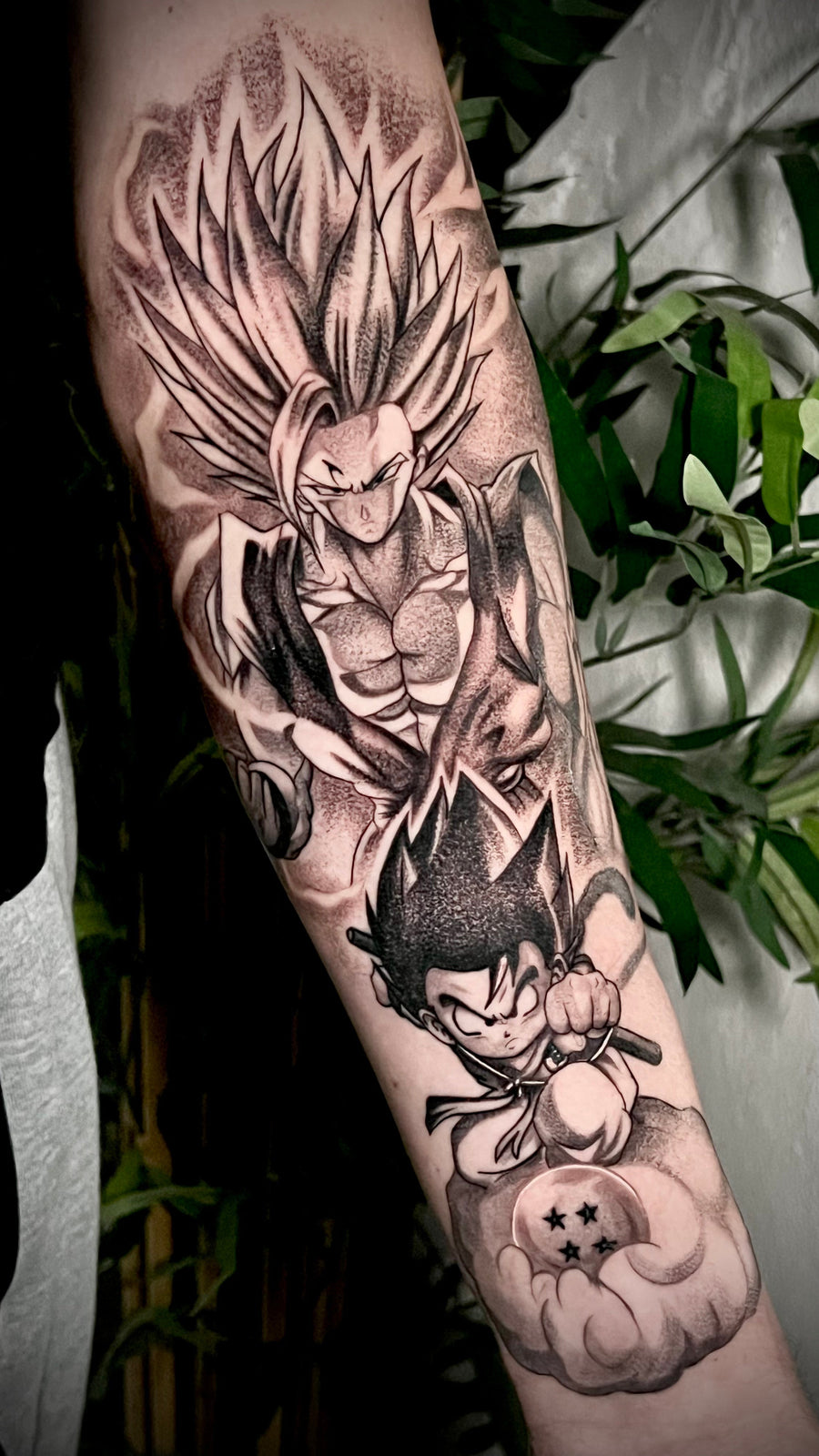 Black and grey anime tattoo by Carlos