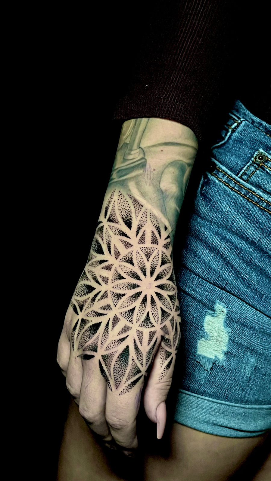 Mandala dotwork hand tattoo by Carlos